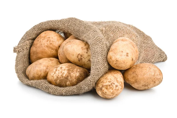 Récolte crue des pommes de terre dans un sac en toile de jute — Photo
