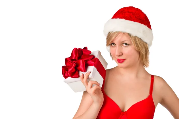Natal menina segurando presente vestindo chapéu de Santa — Fotografia de Stock