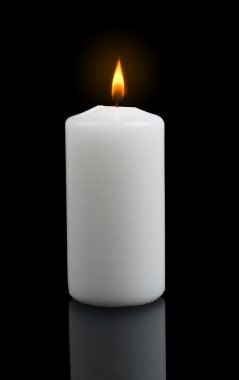 Closeup of burning candle clipart