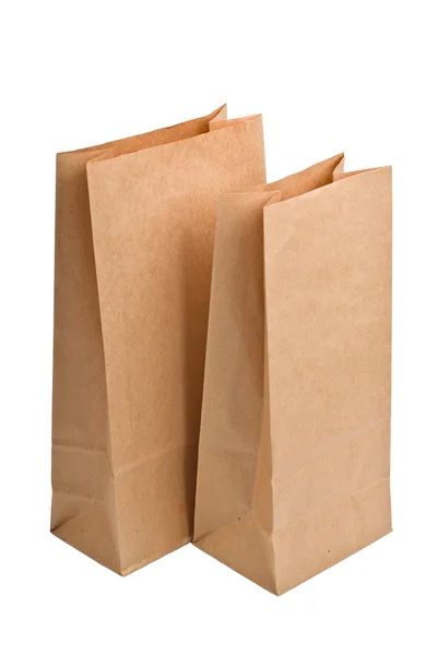Sacos de papel de compras isolados em branco — Fotografia de Stock