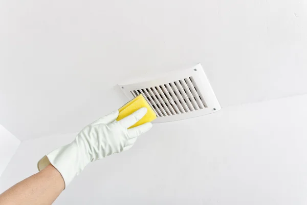 Hand cleaning ceiling. — Stock Photo, Image