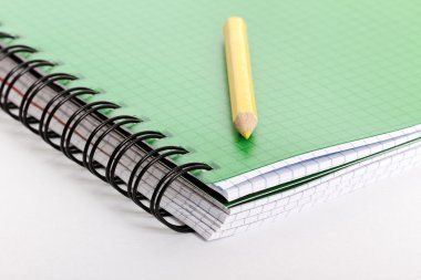 Notebook and pencil. clipart