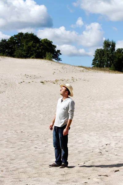 Man in dunes. — Stock Photo, Image