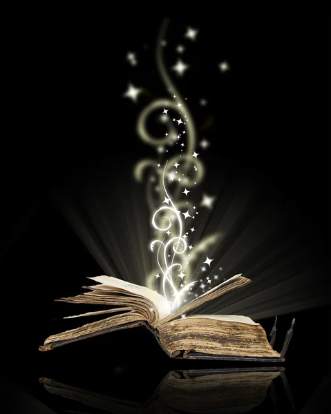 Open book magic on black Stock Photo by ©Kudryashka 2331360