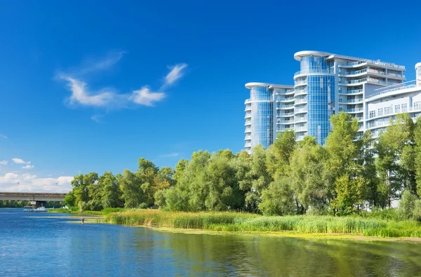 stock image Buildings by the riverside