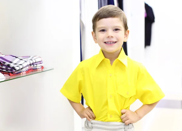 stock image Little boy doing shopping