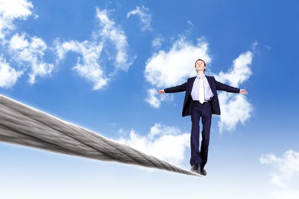 stock image Business man balancing on the rope