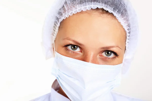 Young female scientist wearing face mask — Stock Photo, Image