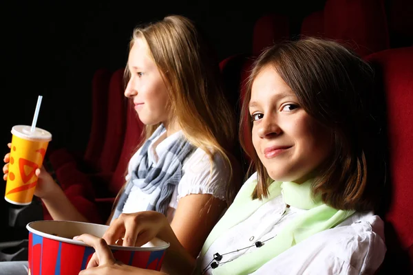 stock image Two young girls watching in cinema