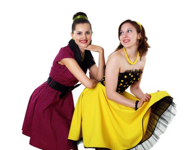 Two young woman in bright colour dresses clipart