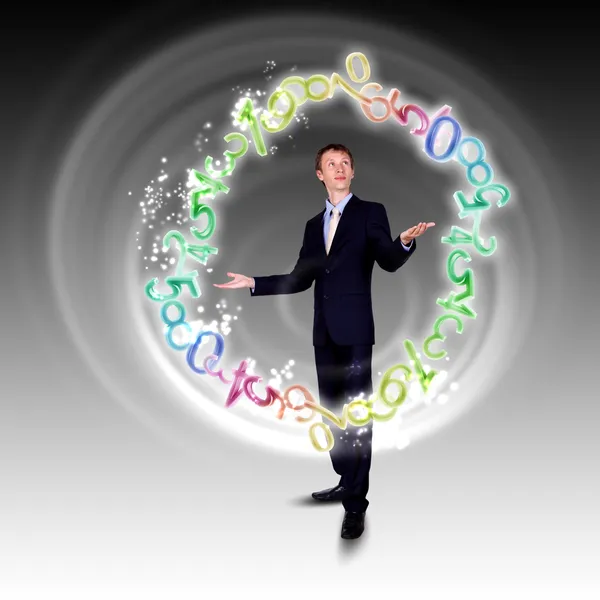 Ο άνθρωπος των επιχειρήσεων juggling με αριθμούς και σύμβολα — Φωτογραφία Αρχείου