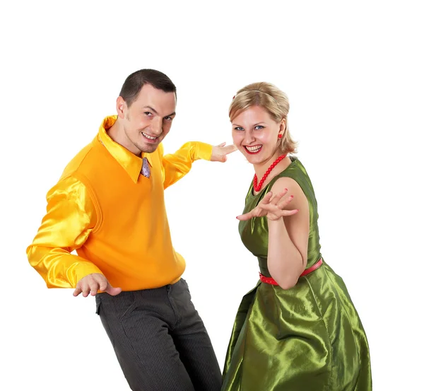 跳舞对年轻夫妇在明亮的颜色穿 — 图库照片