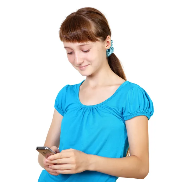 Söt tonårsflicka med mobiltelefon — Stockfoto