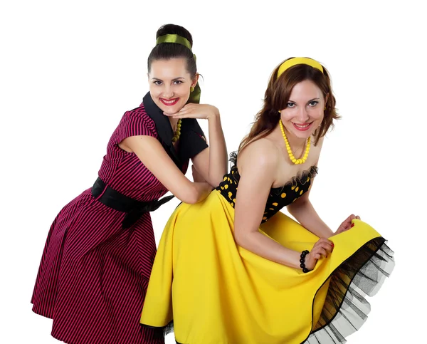Dos mujeres jóvenes en vestidos de color brillante —  Fotos de Stock