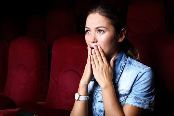 Young girl in cinema Stock Image