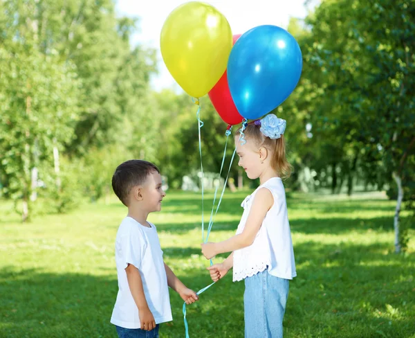 Happy sister and brother outdoors — Stock Photo, Image