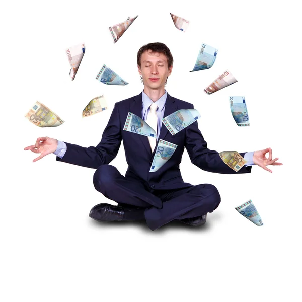 Молодой бизнесмен со многими банкнотами — стоковое фото