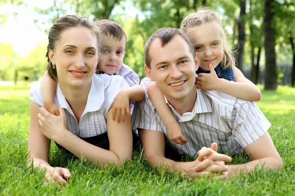 Family together in the park Stock Image