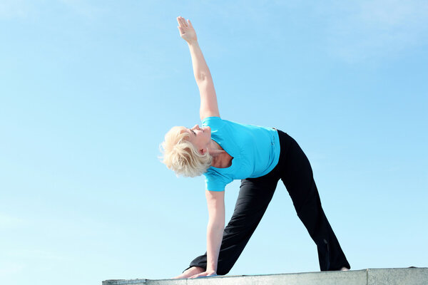 Portrait of a senior woman doing yoga