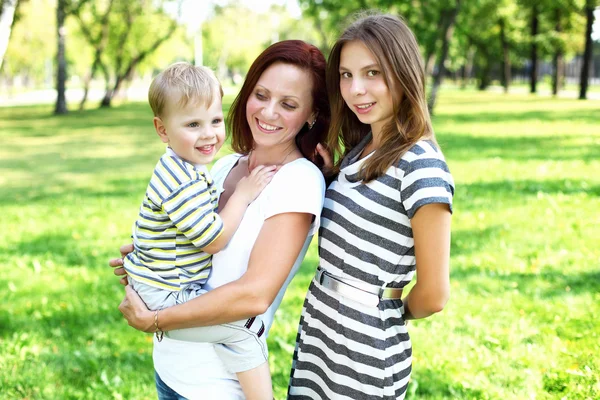 Mother with her daughter in summer park — Stock Photo, Image