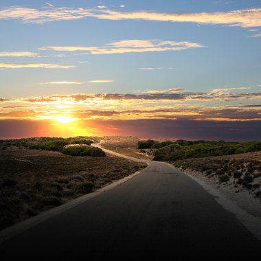 Asphalt road in countryside clipart