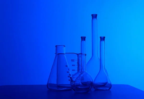 Chemistry laboratory equipment and glass tubes — Stock Photo, Image