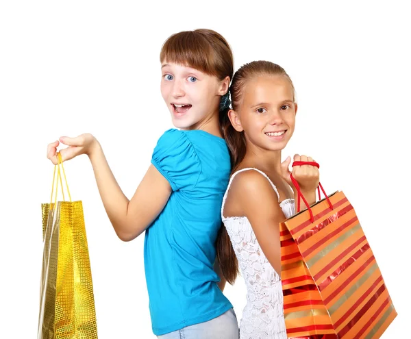 Pretty teenage girls with shopping bags — Stock Photo, Image