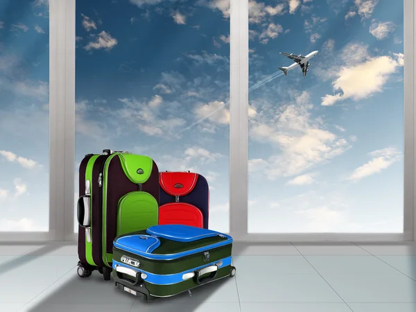 赤いスーツケースと飛行機 — ストック写真