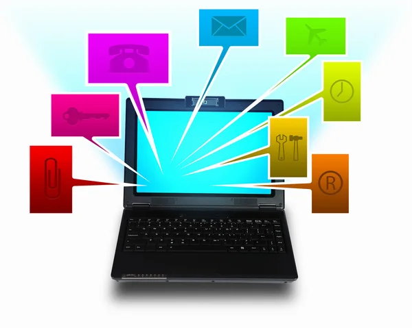 Laptopcomputer met symbolen mededeling — Stockfoto