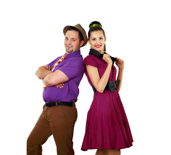 Young dancing couple in bright colour wear