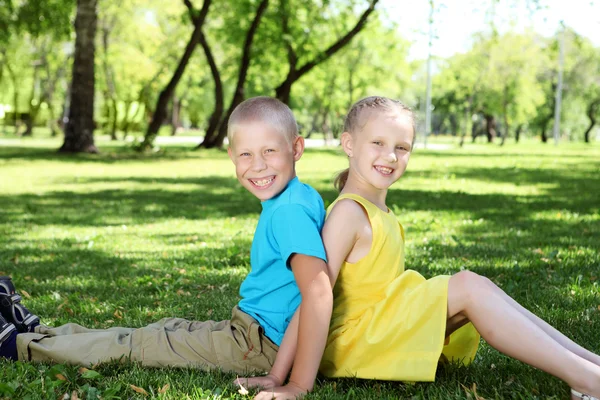 Little friends in the summer park — Stock Photo, Image