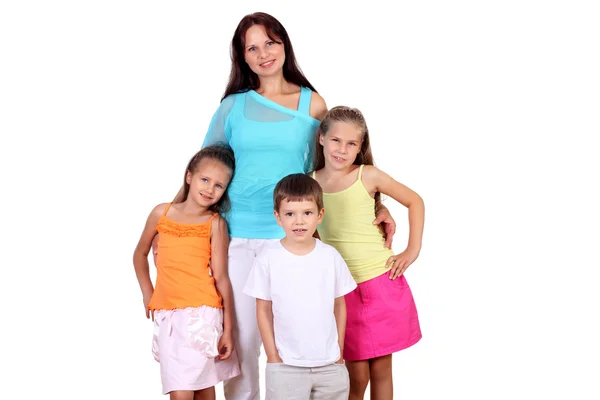Moeder met haar drie kinderen in studio — Stockfoto