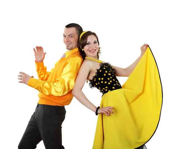 Parlak renkli genç dans eden bir çift giymek — Stok fotoğraf
