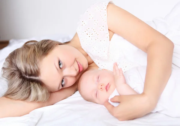 Portrait of a young mother and baby — Stock Photo, Image