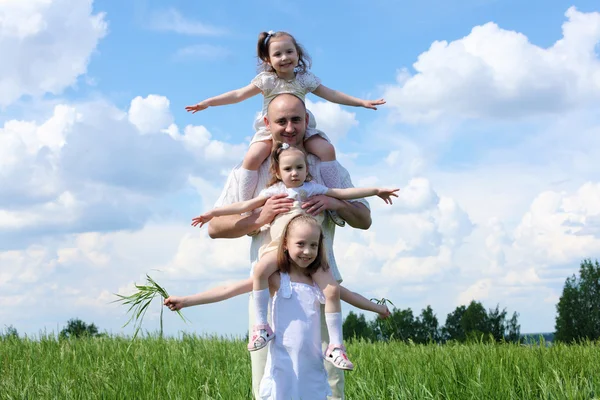 Family with children in summer day outdoors — Stock Photo, Image