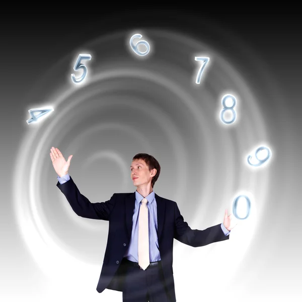 Zsonglőrködés a számok és szimbólumok üzletember — Stock Fotó