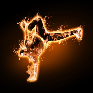 Fire dancer against black background clipart