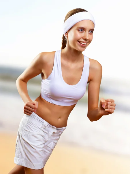 Young pretty woman in sport wear — Stock Photo, Image