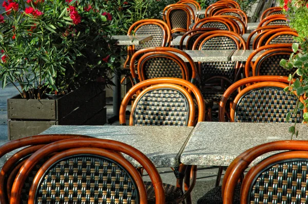 stock image Tables and chairs in an outdoor cafe