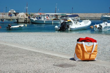 Summer beach bag at greek marina,Leonidio,Greece clipart