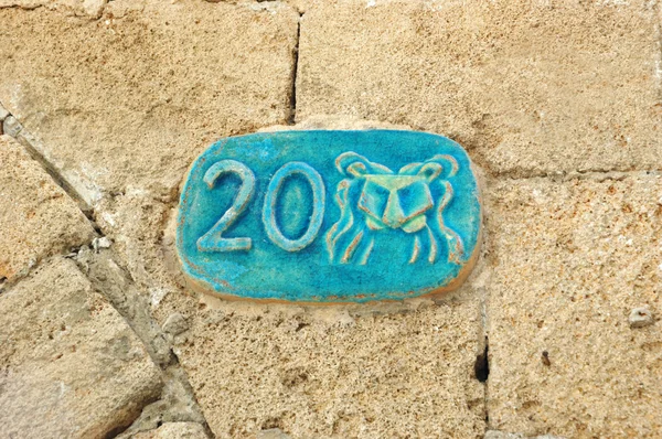 Old street plate with Lion zodiac sign, Jaffa, Israel — Stock Photo, Image