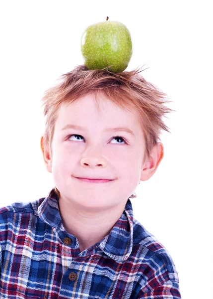 Little boy with an apple — Stock Photo, Image