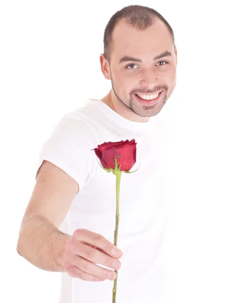 Jeune homme avec fleur à la main — Photo