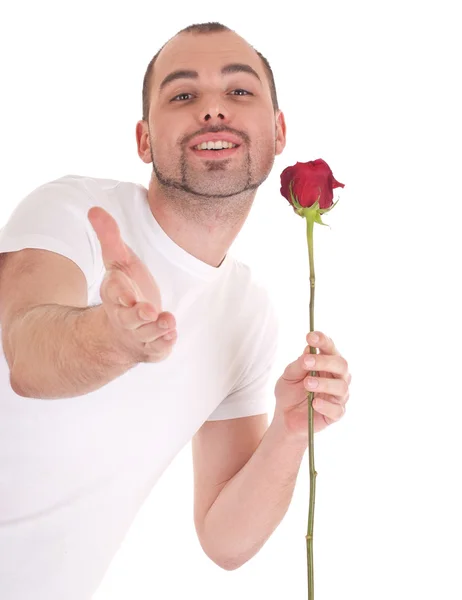 Młody człowiek z kwiatkiem w ręku — Zdjęcie stockowe