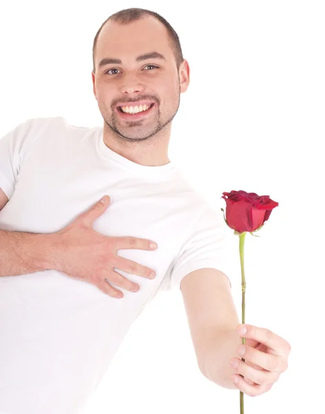 Jeune homme avec fleur à la main — Photo