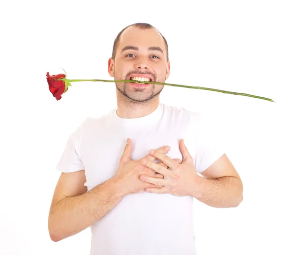 Junger Mann mit einer Blume — Stockfoto