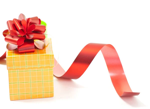 Present box with red ribbon bow — Stock Photo, Image