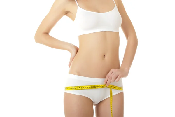 Woman measuring shape of hips — Stock Photo, Image