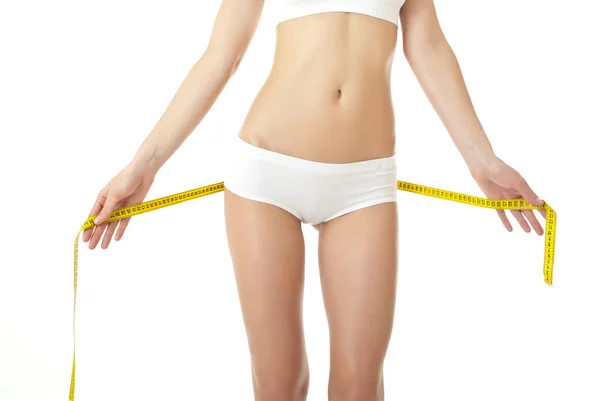 아름 다운 엉덩이의 모양을 측정 하는 여자 — 스톡 사진