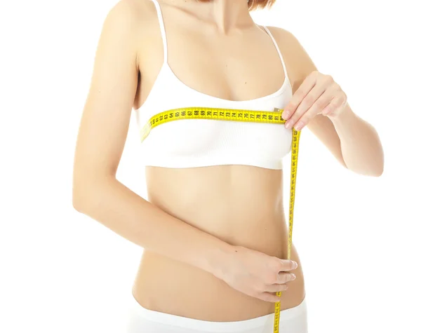 Vrouw lichaamsverzorging en gele maatregel op dijen — Stockfoto